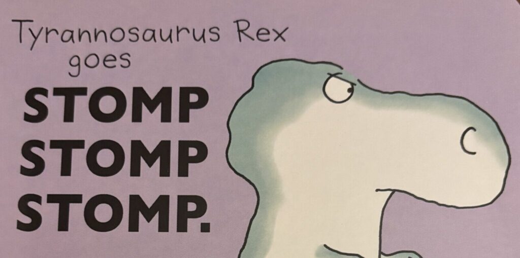 inside page of book with t-rex dancing